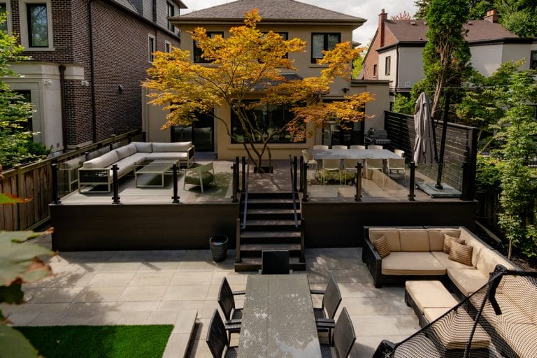 Deck building with glass railings at Glenayr Rd, Toronto, landscaping project