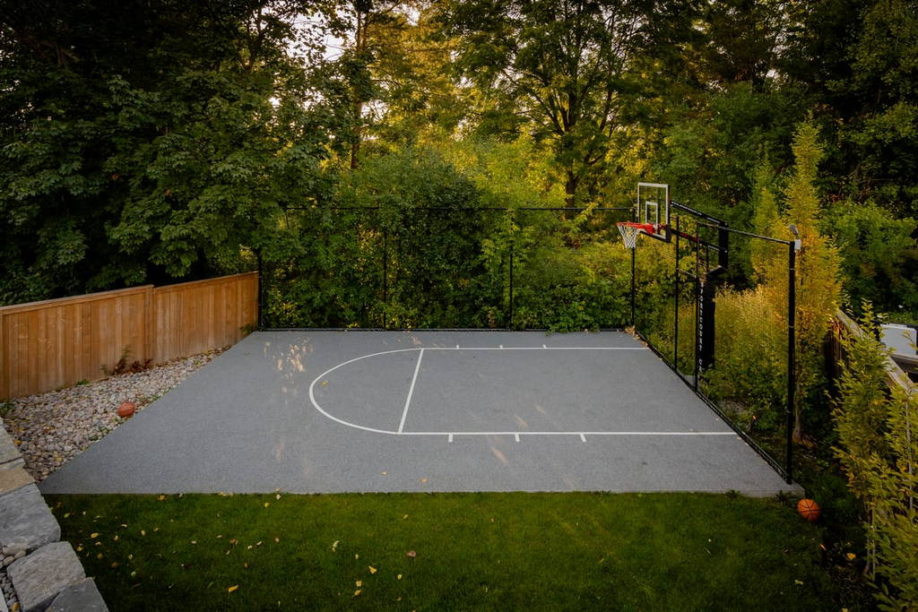 Landscaping Project at Rumsey Rd, Toronto featuring sports court installation