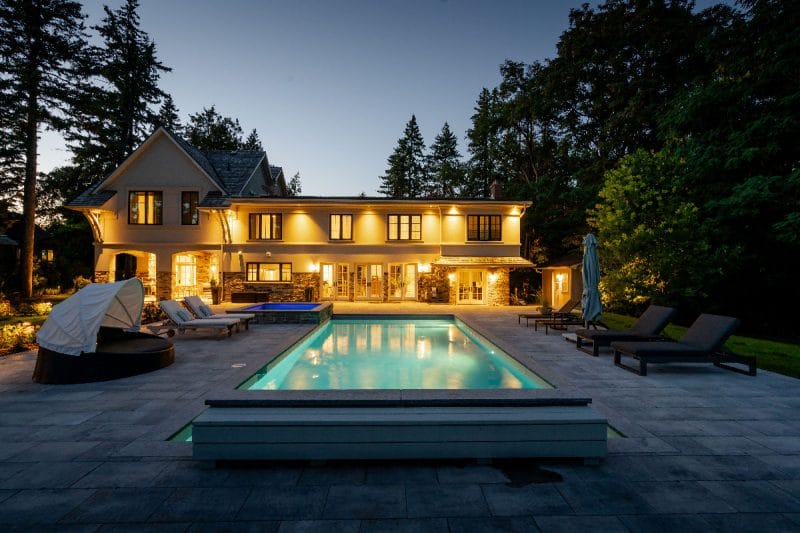 Inground pool construction with pool side patio