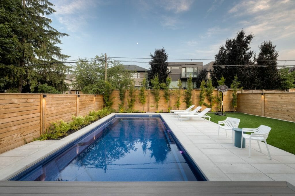 Fiberglass Pool construction with Hidden Automatic Cover and Concrete Patio