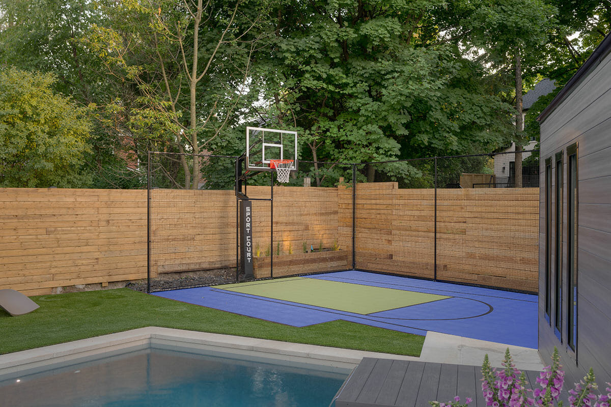 Abu Residence, Toronto Concrete pool construction and Landscaping project featuring installed sports court