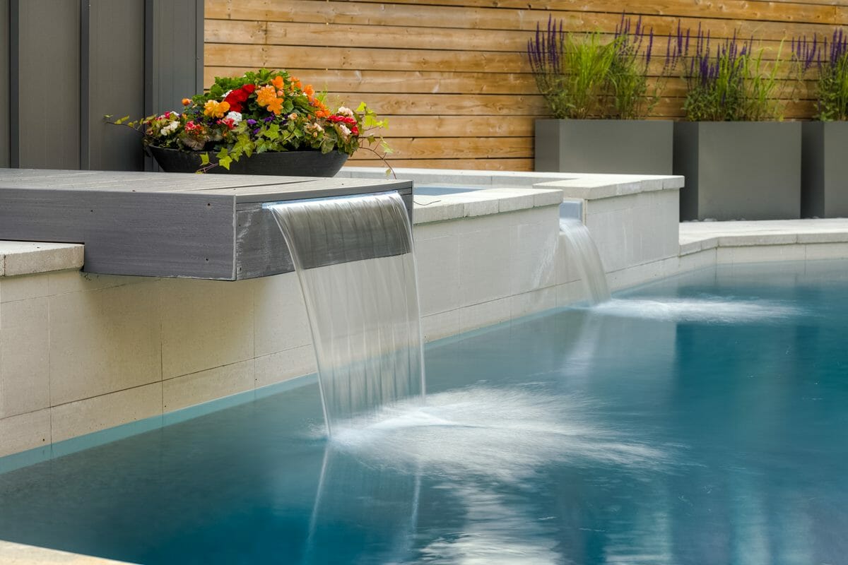 Inground concrete pool construction with Water Features