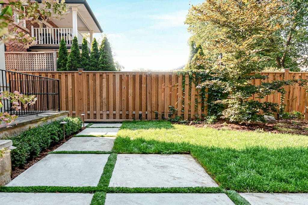Small Backyard Landscaping Project; Featuring Interlocking & Cedar Privacy Fence.