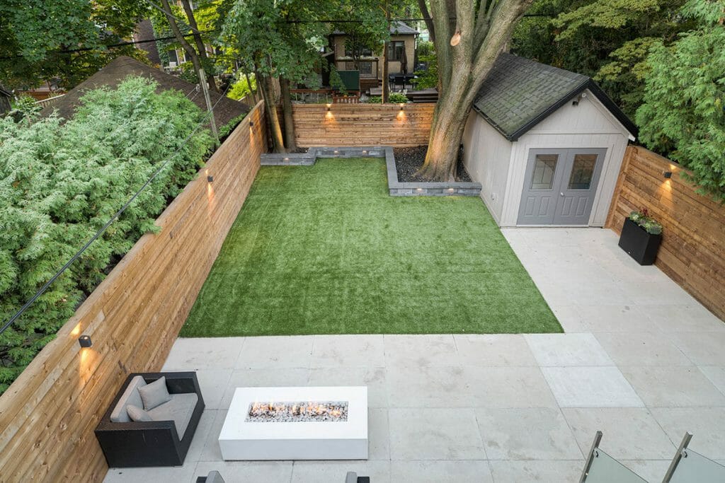 Landscape construction Project with Retaining Wall, Outdoor Fireplace & Privacy Fence