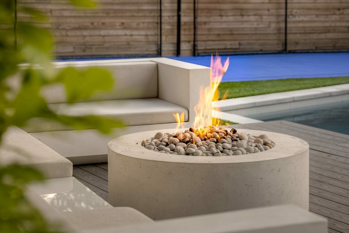 Completely Updated Backyard Landscaping Project Featuring an Outdoor Fireplace.