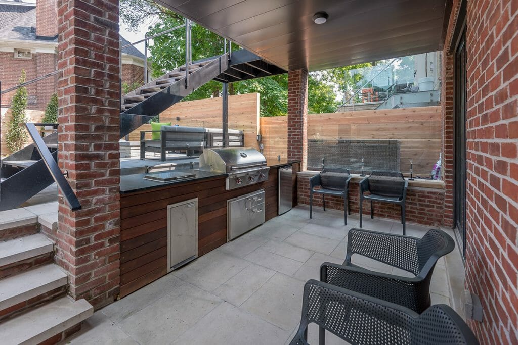 Outdoor kitchen build under composite deck by M.E. contracting 