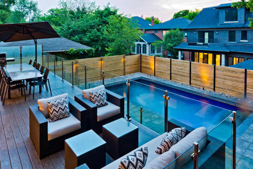 Toronto Backyard Inground Pool and Deck construction project feature fence and other landscape elements installed by M.E. contracting