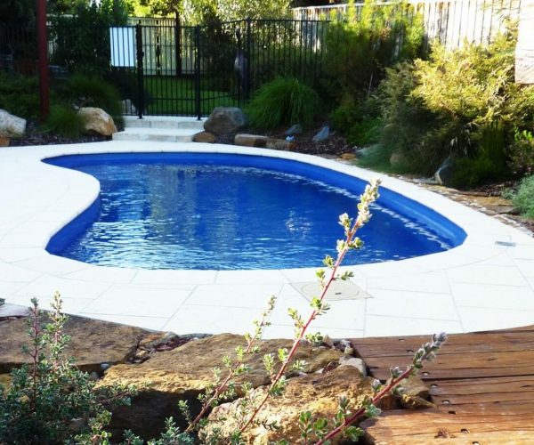pool company in Toronto displays The Tanning Ledge – In Ground Fiberglass Pool