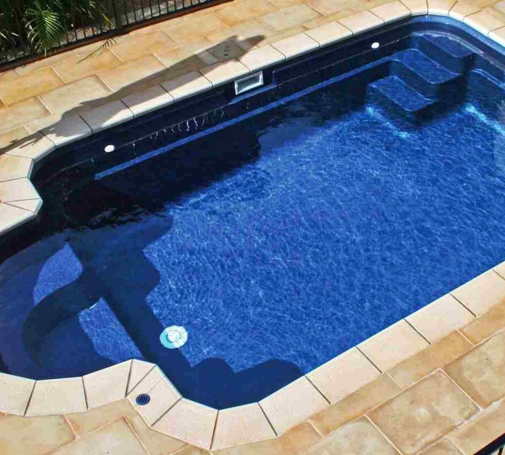 The Courtyard Roman - In Ground Fiberglass Pool display model