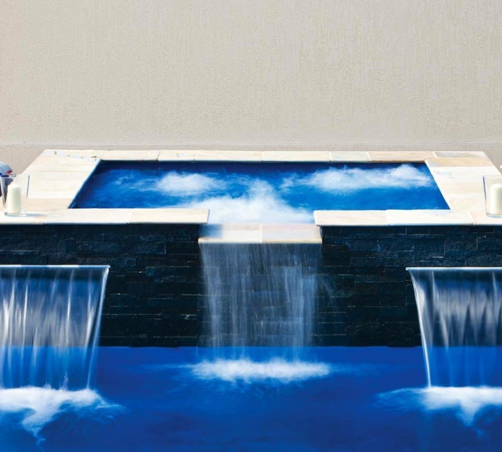 Sorrento Fiberglass inground pool with water feature by M.E. contracting pool company