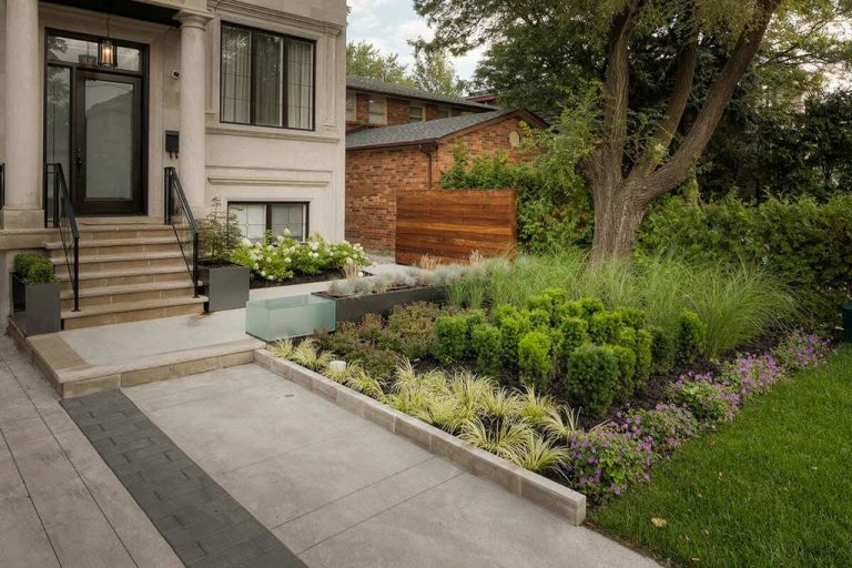 front porch landscaping, interlocking and fencing build by M.E. contracting