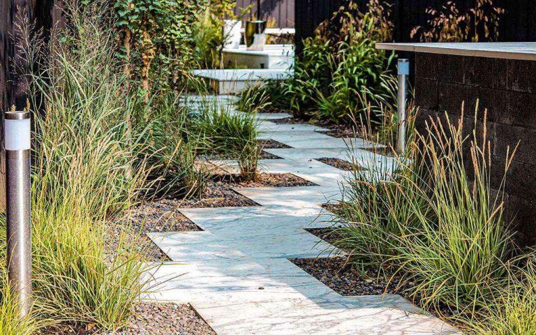 Toronto Landscaping Design & Construction; Featuring Garden Paths Paved With Stone & Fencing by M.E. Contracting
