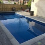 Toronto Pool Company showcase fiberglass pool installation and pool side landscaping