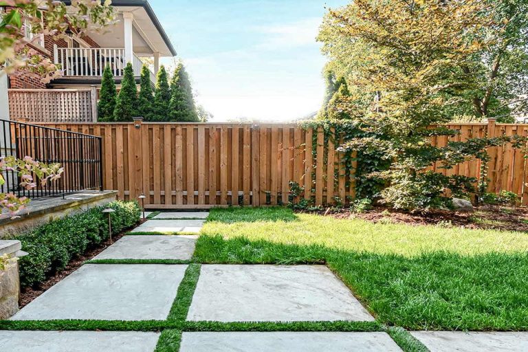 Small Backyard Landscaping Project; Featuring Interlocking & Cedar Privacy Fence.