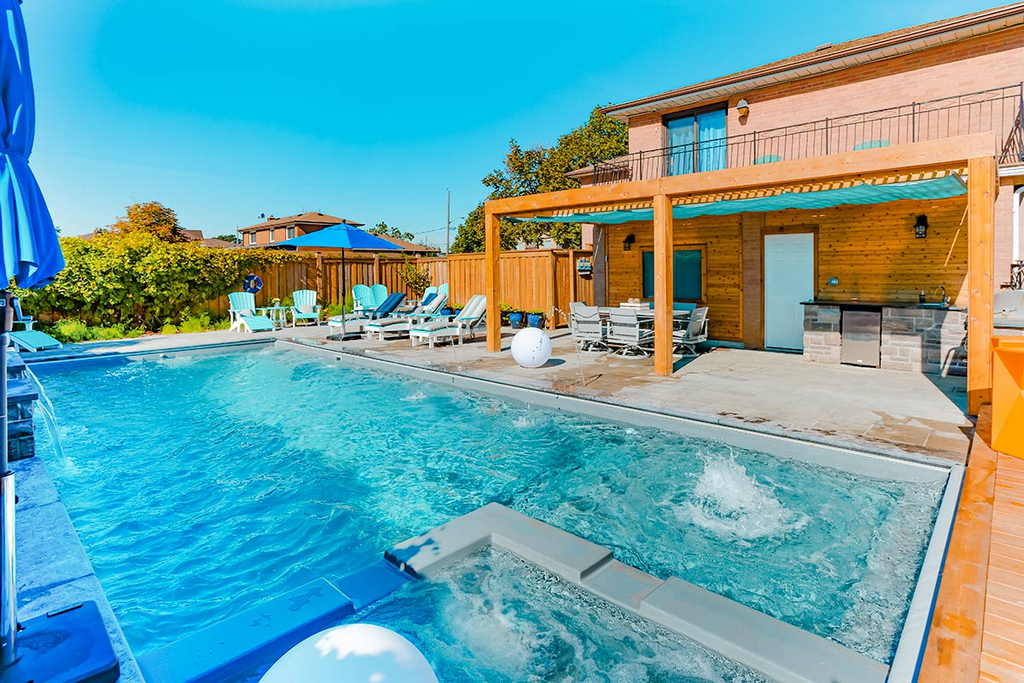 Toronto Landscaping Company; Featuring Pergola, Outdoor Kitchen & Fiberglass Pool Installation.